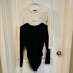 Zara Black and White Long Sleeve Bodysuits